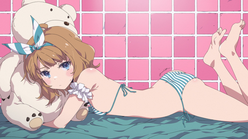 1girl arm_scrunchie ass bare_legs barefoot bed_sheet bikini blue_eyes blush brown_hair commentary feet_up flat_chest hairband highres hugging_doll hugging_object idolmaster idolmaster_million_live! looking_at_viewer looking_to_the_side lying on_stomach oomura_karasu petite side-tie_bikini_bottom signature soles solo striped striped_bikini striped_hairband stuffed_animal stuffed_toy suou_momoko sweatdrop swimsuit symbol-only_commentary teddy_bear tile_wall tiles toes two-tone_bikini