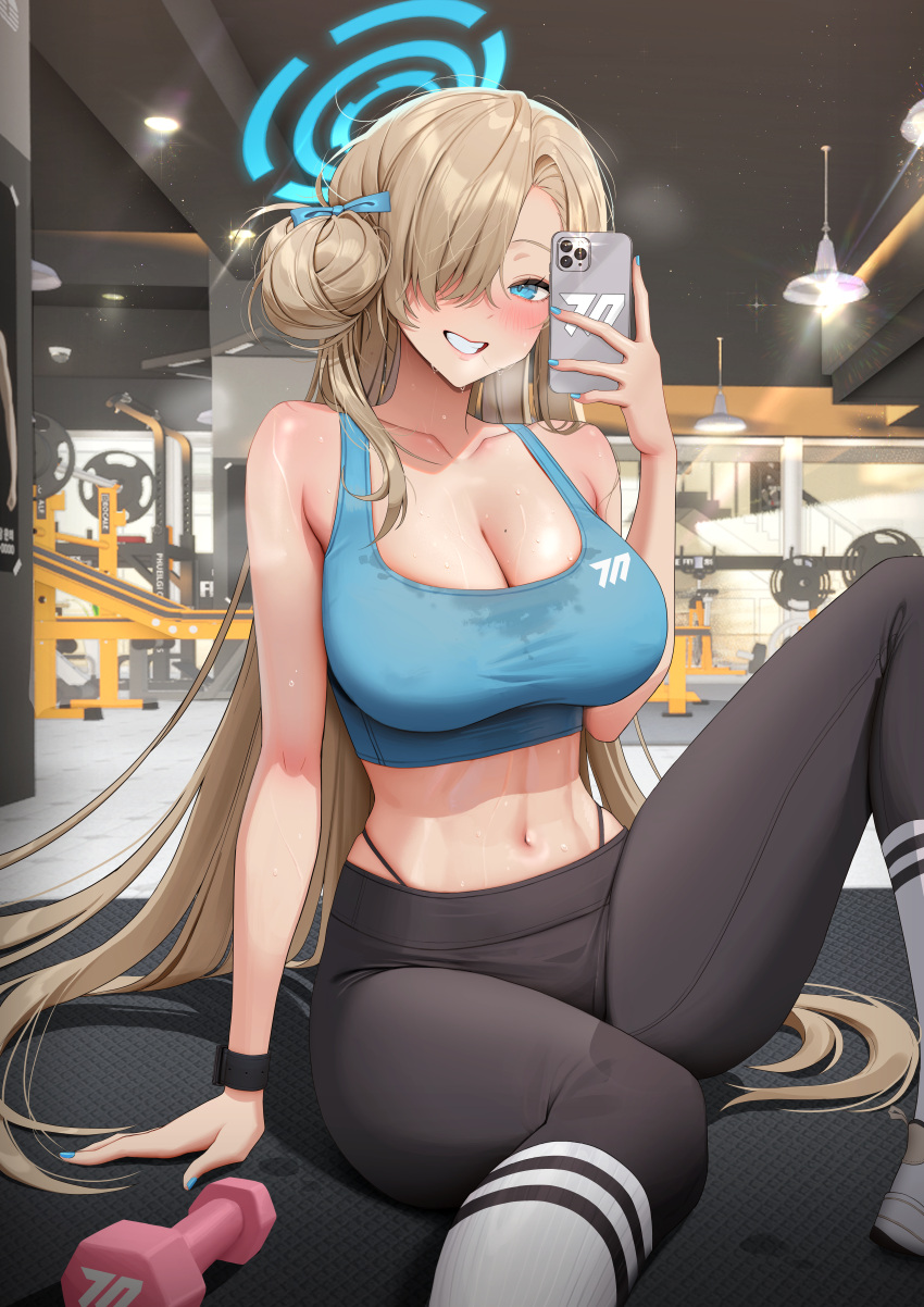 1girl absurdres asuna_(blue_archive) blonde_hair blue_archive blue_eyes blue_nails blue_sports_bra breasts ceiling_light cellphone collarbone grin gym hair_bun hair_over_one_eye halo highres holding holding_phone kkuni large_breasts long_hair midriff mole mole_on_breast navel pants panty_straps phone selfie sitting smartphone smile solo sports_bra stomach sweat teeth very_long_hair yoga_pants