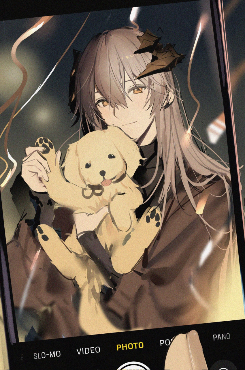 1girl animal arknights black_shirt brown_jacket cellphone cellphone_photo closed_mouth commentary dog dragon_girl dragon_horns earclip fake_screenshot grey_hair hair_between_eyes highres holding holding_animal holding_dog horns jacket joshua_(shisanli934) long_hair looking_at_viewer orange_eyes phone saria_(arknights) shirt smartphone solo