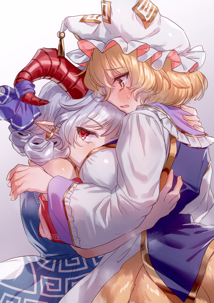 2girls absurdres blonde_hair blush bow breasts curly_hair dress earrings fox_tail hat highres horn_ornament horn_ribbon horns hug jewelry long_sleeves masanaga_(tsukasa) mob_cap multiple_girls multiple_tails open_mouth pointy_ears red_eyes red_horns ribbon sheep_horns short_hair short_sleeves simple_background tail touhou toutetsu_yuuma white_hair yakumo_ran yuri