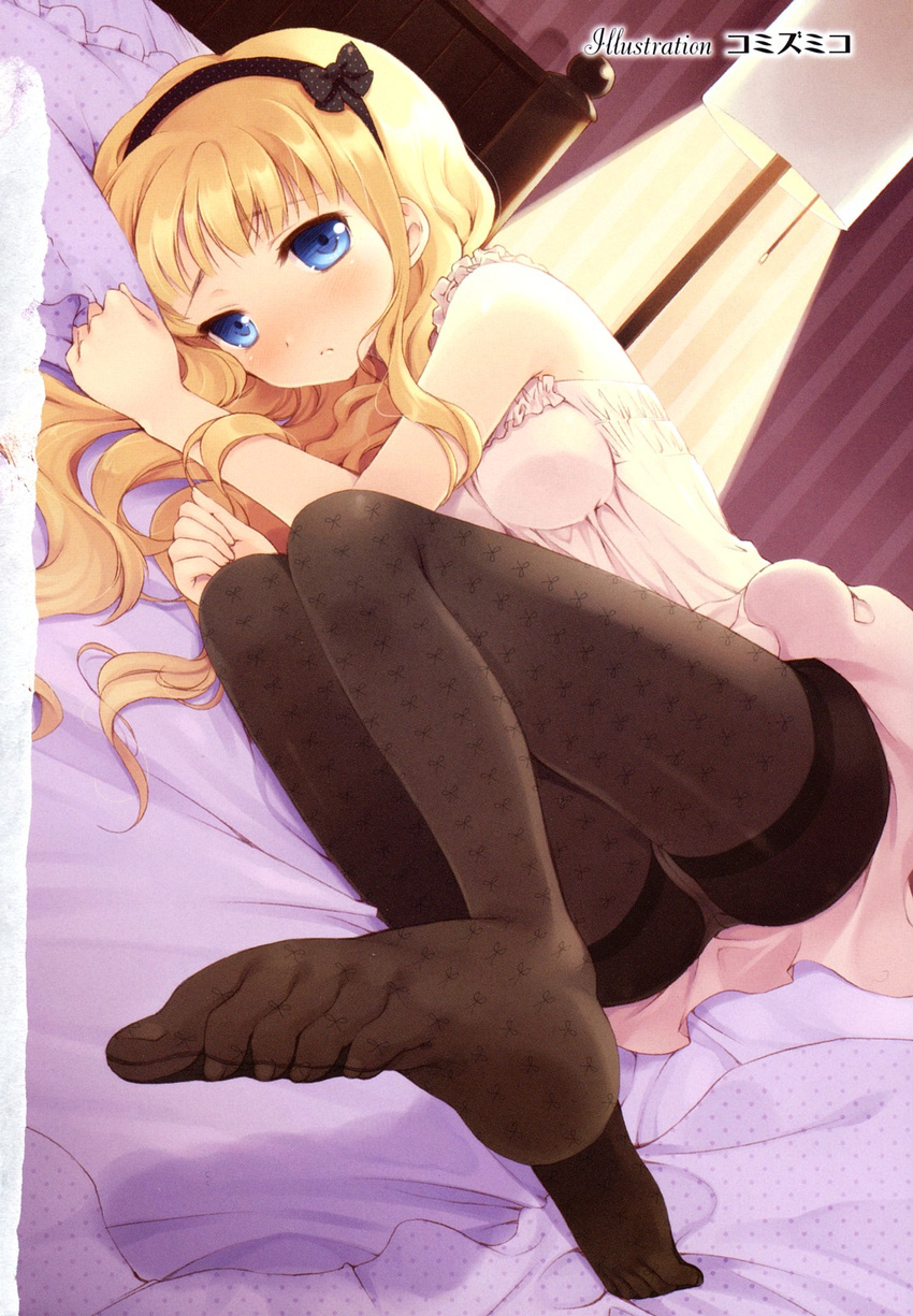 bed blonde_hair blue_eyes blush copyright_request dutch_angle feet hairband highres komi_zumiko lamp legs lying nightgown on_side pantyhose pov_feet print_legwear ribbon solo