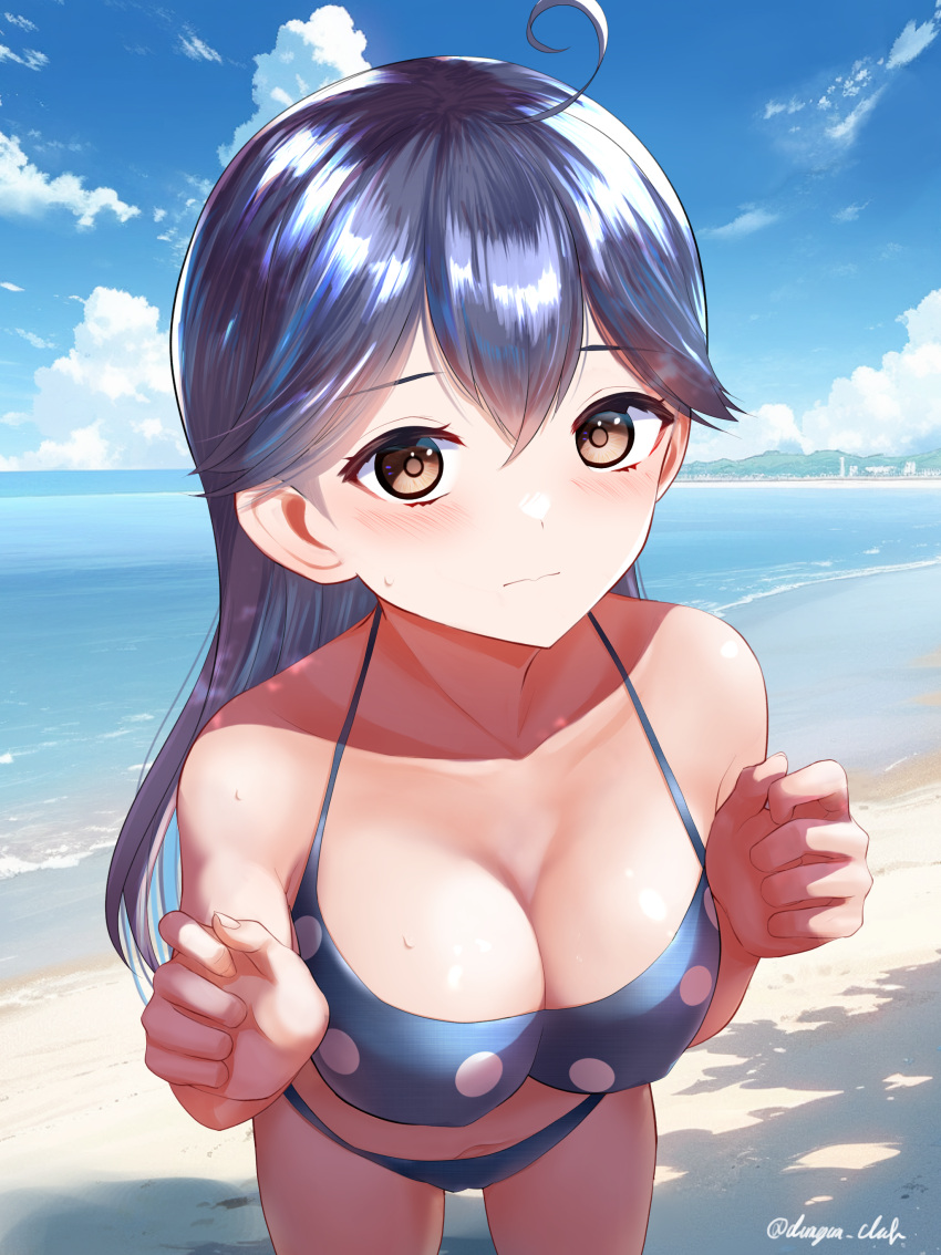 1girl absurdres adapted_costume ahoge beach bikini black_hair blue_bikini blue_sky breasts brown_eyes cleavage cloud collarbone dangan_kurabu day highres kantai_collection large_breasts leaning_forward mountainous_horizon ocean outdoors polka_dot polka_dot_bikini sky solo swimsuit ushio_(kancolle)