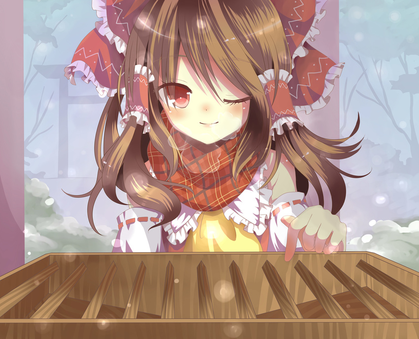 absurdres ascot bare_shoulders blush bow box brown_hair detached_sleeves donation_box eyelashes forest hair_bow hair_tubes hakurei_reimu highres light_smile lips long_hair nature one_eye_closed pointing red_eyes risui_(suzu_rks) scarf snow solo torii touhou