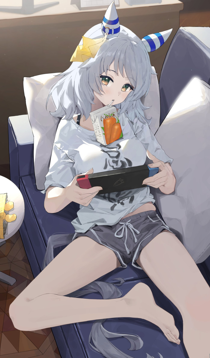 1girl alternate_costume animal_ears bare_legs barefoot breasts brown_eyes commentary couch desk ear_covers ear_ornament feet foot_out_of_frame grey_hair grey_shorts highres hishi_miracle_(umamusume) horse_ears horse_girl horse_tail indoors juice_box legs looking_at_viewer medium_breasts medium_hair ningen_gokko nintendo_switch on_couch open_mouth pillow shirt short_shorts short_sleeves shorts smile solo tail toenails toes umamusume white_shirt