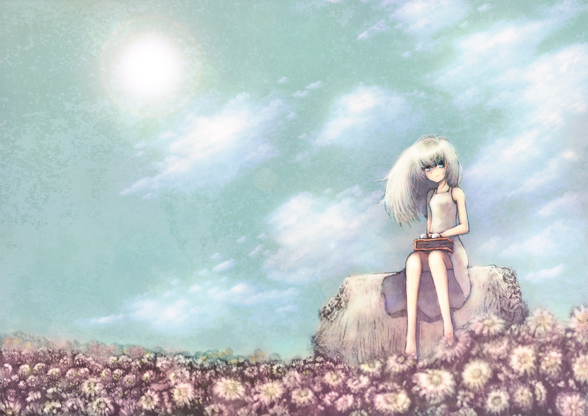 bare_shoulders barefoot blackball blue_eyes blurry book cloud day depth_of_field dress eyewear_removed field flower flower_field from_ground glasses highres lens_flare light_smile long_hair looking_at_viewer meadow original rock sitting sky solo sun white_dress white_hair