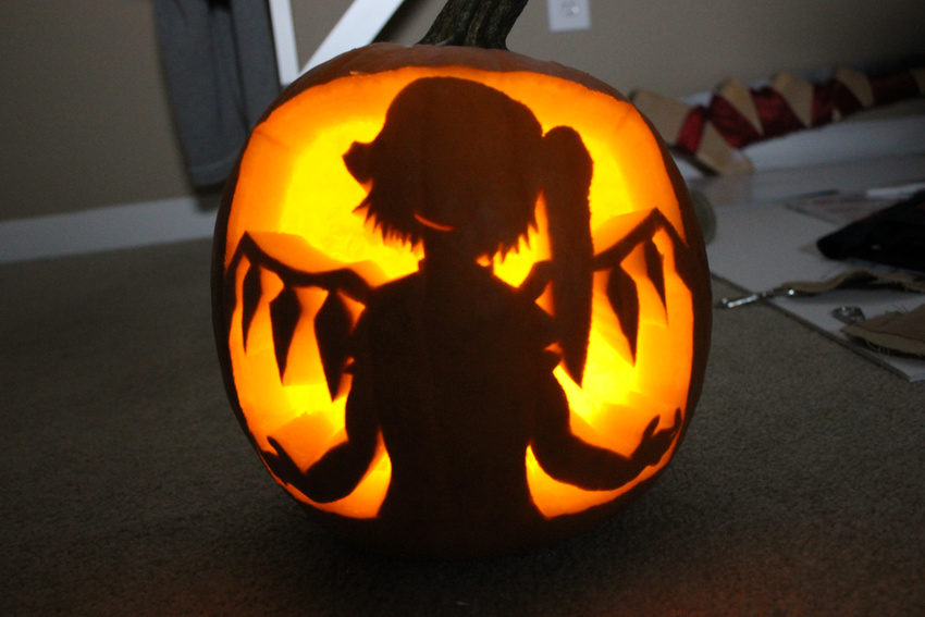 absurdres bad_apple!! female flandre_scarlet halloween highres jack-o'-lantern jack-o'-lantern photo pumpkin side_ponytail silhouette smile touhou wings yabasi_kyudo