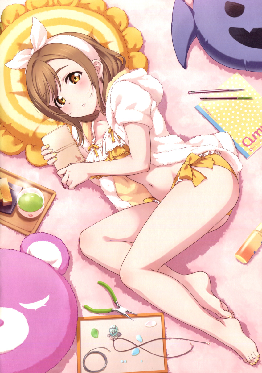 1girl absurdres ass barefoot blush bra breasts brown_eyes brown_hair collarbone copyright_name eyebrows_visible_through_hair feet frilled_bra frills from_above hair_ornament highres holding inou_shin kunikida_hanamaru looking_at_viewer love_live! love_live!_sunshine!! lying medium_breasts navel on_side parted_lips ribbon scan short_hair solo underwear underwear_only yellow_ribbon