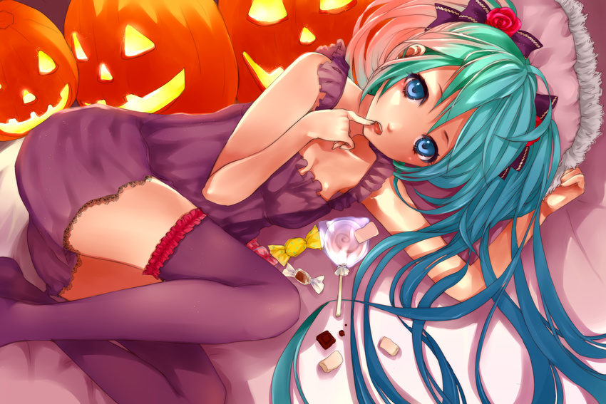 alternate_costume aqua_hair bad_id bad_pixiv_id bed blue_eyes blue_hair bow candy finger_to_mouth food gradient_hair hair_bow halloween hatsune_miku highres jack-o'-lantern lollipop long_hair lying multicolored_hair on_side pillow pink_hair pumpkin purple_skirt ribbon roku_(hikokeng) skirt solo swirl_lollipop thighhighs twintails very_long_hair vocaloid zettai_ryouiki