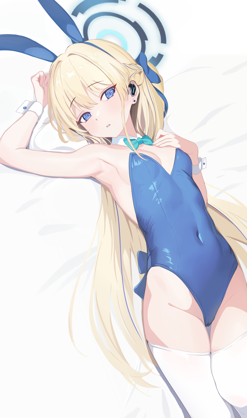 1girl animal_ears armpits bed_sheet blonde_hair blue_archive blue_eyes blue_hair blue_halo blue_leotard braid breasts covered_navel detached_collar fake_animal_ears groin halo highres leotard long_hair multicolored_hair official_alternate_costume parted_lips rabbit_ears small_breasts solo strapless strapless_leotard streaked_hair thighhighs toki_(blue_archive) toki_(bunny)_(blue_archive) white_thighhighs wrist_cuffs zhnyy3