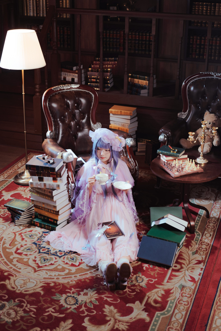 1girl absurdres book book_stack carpet chess_piece chessboard highres indoors lamp patchouli_knowledge photo_(medium) sinkai_cos sitting