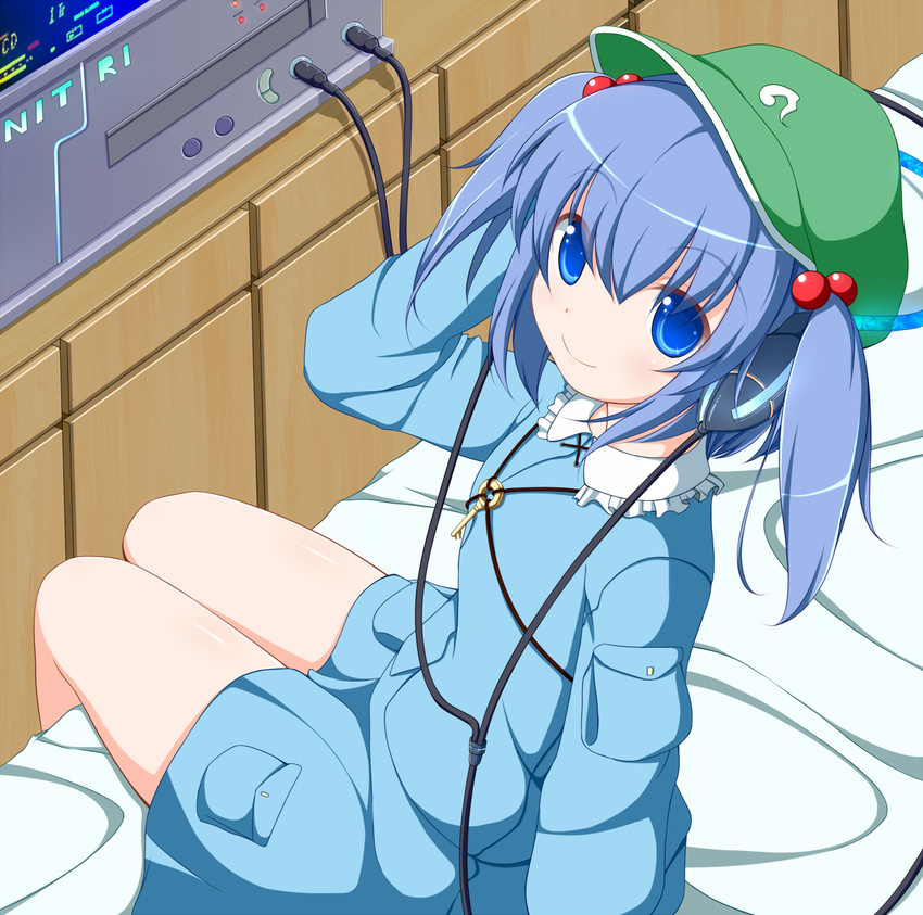 arm_support bed blue_eyes blue_hair hair_bobbles hair_ornament hat headphones highres kawashiro_nitori key nikku_(ra) on_bed short_hair skirt smile solo touhou two_side_up