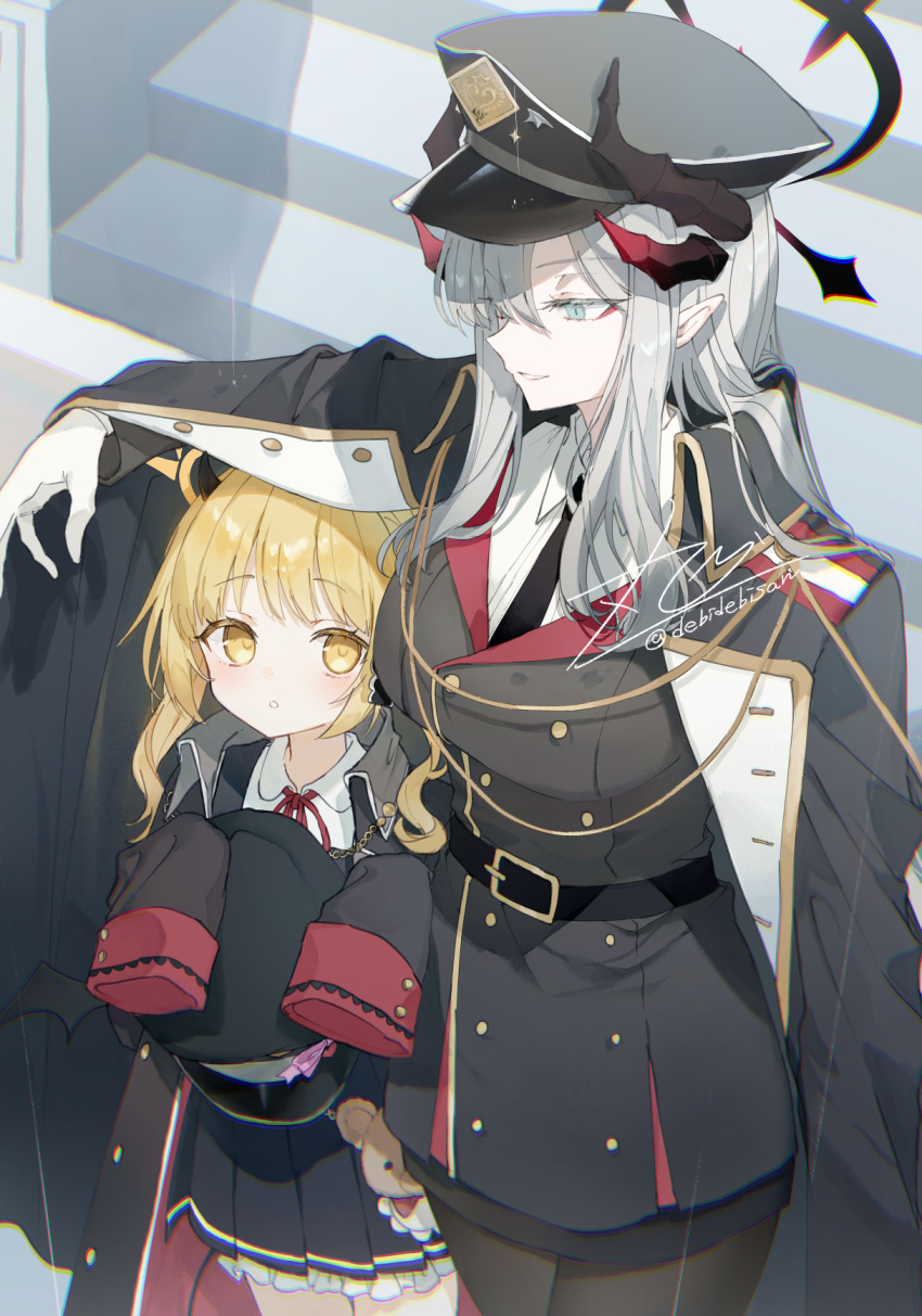 2girls belt_buckle black_coat black_pantyhose blonde_hair blue_archive blush breasts buckle chibirisu coat demon_horns demon_tail demon_wings grey_hair halo hat highres horns ibuki_(blue_archive) large_breasts looking_at_another makoto_(blue_archive) military_uniform multiple_girls pantyhose peaked_cap pointy_ears school_uniform signature sleeves_past_fingers sleeves_past_wrists tail uniform wings