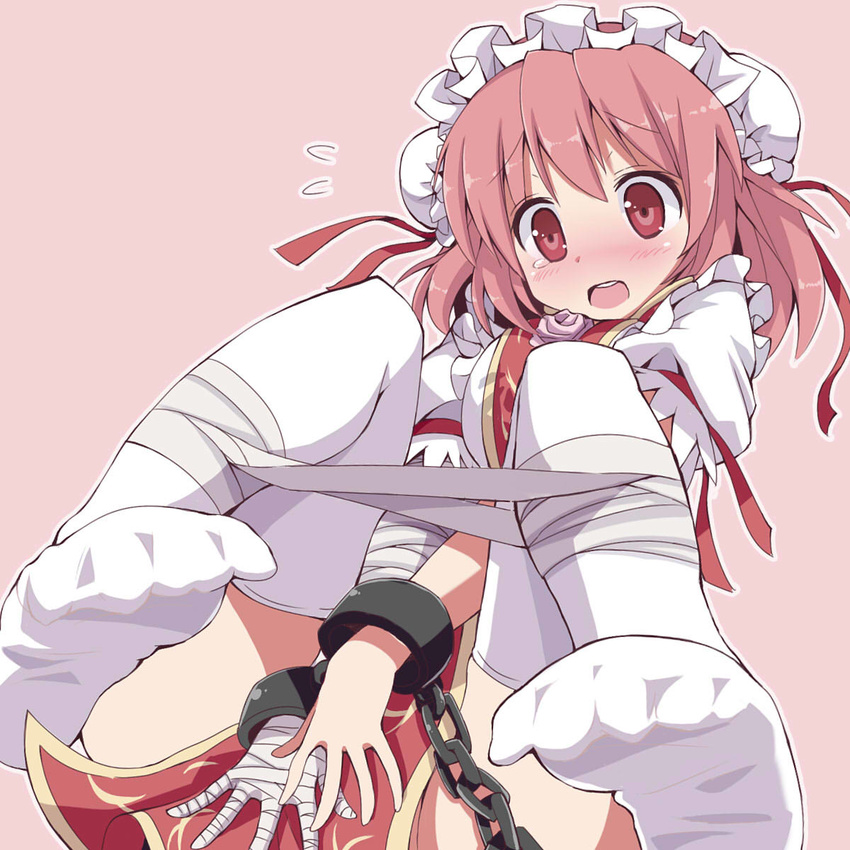 alternate_costume bandages blush bun_cover chain covering covering_crotch cuffs double_bun enmaided feet givuchoko hair_ribbon highres ibaraki_kasen legs maid open_mouth pink_background pink_eyes pink_hair red_eyes ribbon shackles short_hair simple_background solo tabard thighhighs touhou white_legwear