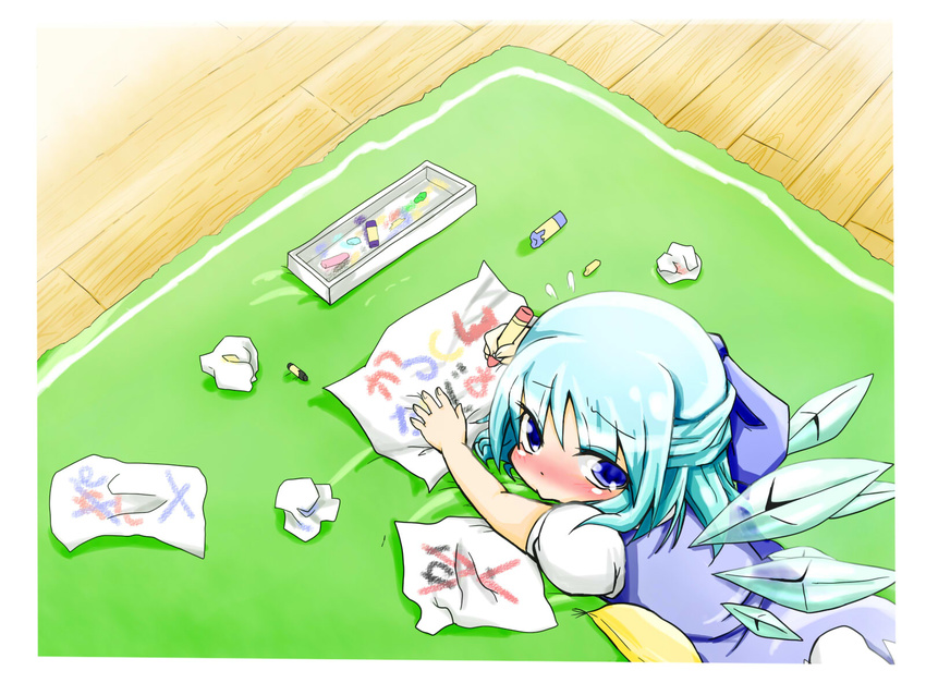 :&gt; blue_dress blue_eyes blue_hair blush box cirno crayon dress flying_sweatdrops from_above hair_ribbon highres looking_at_viewer looking_back looking_up lying nari0518 on_stomach outstretched_arm paper pillow puffy_sleeves ribbon rug short_hair short_sleeves solo tears touhou wings wooden_floor writing