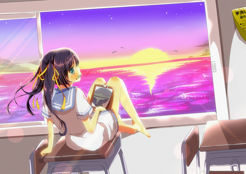 arm_support bare_legs barefoot black_hair bow desk drawing green_eyes hair_bow hair_ornament hair_ribbon indoors legs looking_at_viewer mouth_hold oekaki_musume original pencil picture_(object) ribbon school_desk school_uniform serafuku sitting solo sunset twintails wind yuimari