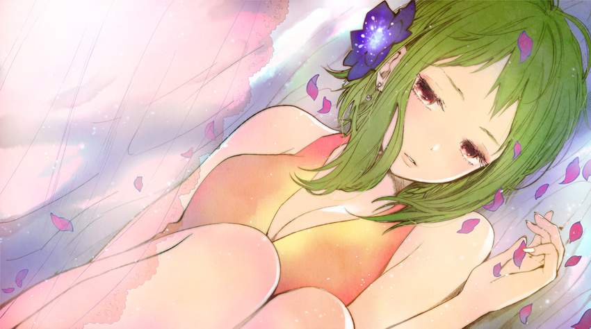 earrings flower green_eyes green_hair gumi hair_flower hair_ornament jewelry knees_on_chest lips lying on_back petals short_hair solo vocaloid yokoyari_mengo