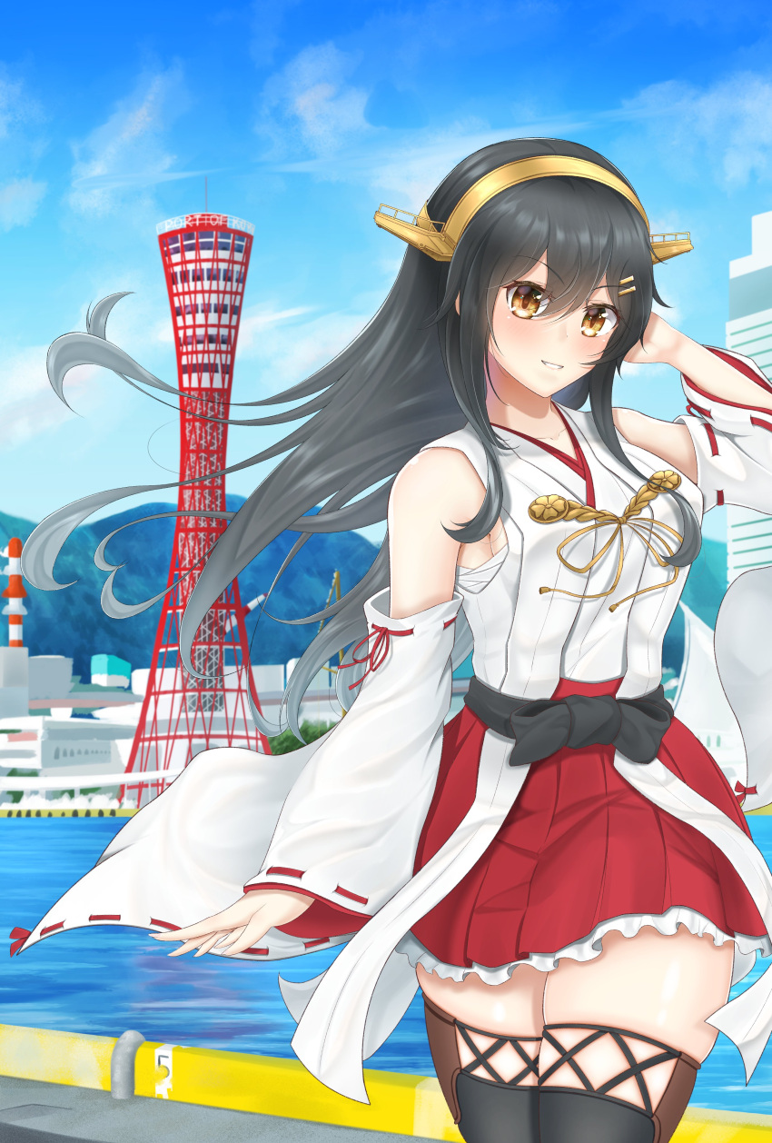 1girl absurdres bare_shoulders black_hair blue_sky boots brown_eyes cloud cowboy_shot day detached_sleeves hairband hakama hakama_short_skirt hakama_skirt haruna_(kancolle) headgear highres japanese_clothes kantai_collection kobe kobe_port_tower long_hair matsu_(matsubozu867) nontraditional_miko outdoors red_hakama red_skirt ribbon-trimmed_sleeves ribbon_trim skirt sky solo thigh_boots water