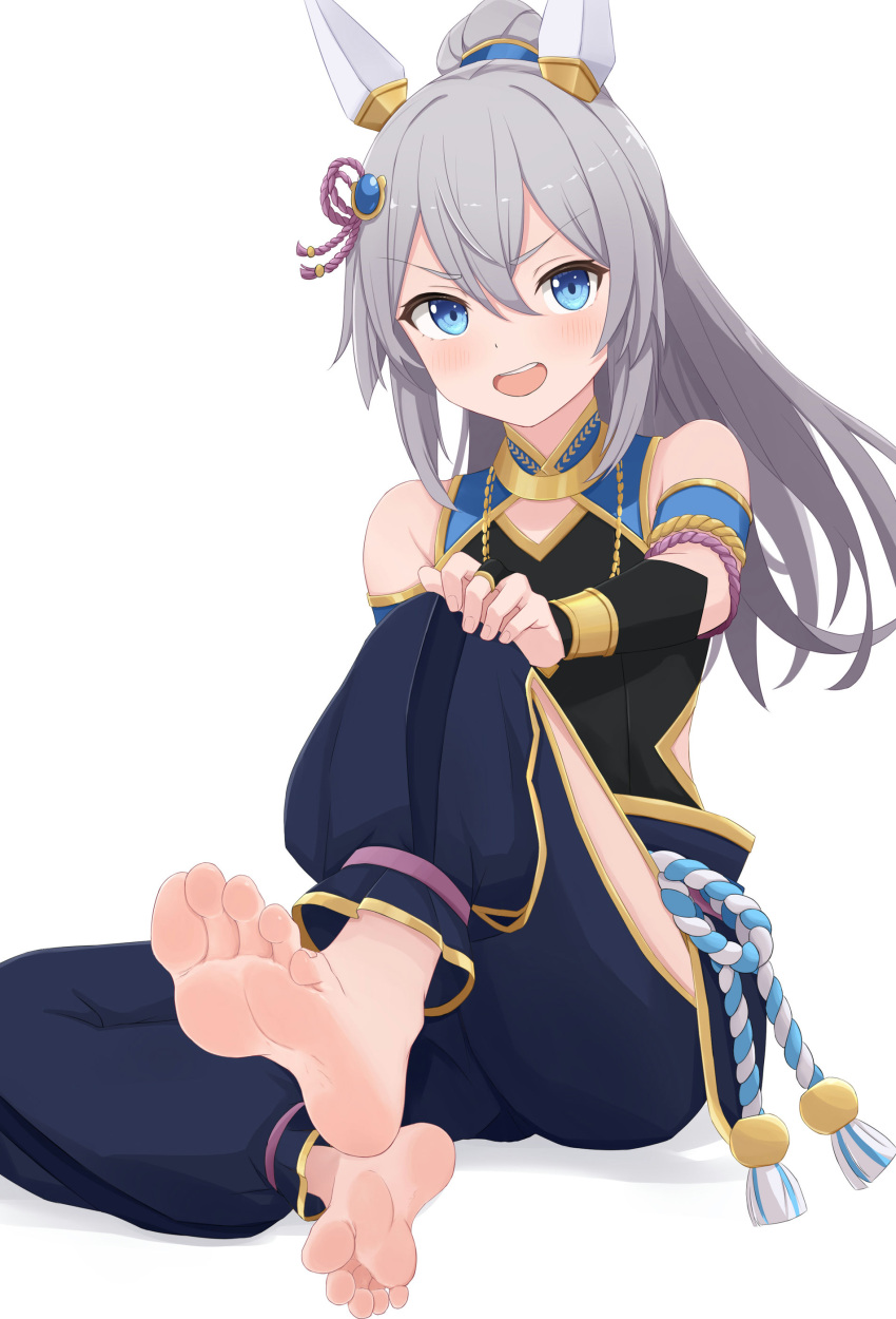 1girl absurdres animal_ears armlet baggy_pants bare_shoulders barefoot blue_eyes blue_pants blush bracelet double-parted_bangs ear_covers eyelashes feet foot_focus foot_up full_body gold_trim grey_hair hair_between_eyes hair_ornament highres horse_ears horse_girl jewelry knee_up long_hair looking_at_viewer official_alternate_costume official_alternate_hairstyle on_ground open_mouth pants pinkiuzu ponytail rope shadow shimenawa side_slit simple_background sitting sleeveless soles solo tamamo_cross_(fierce_thunder_god)_(umamusume) tamamo_cross_(umamusume) tassel teeth toenails toes umamusume upper_teeth_only v-shaped_eyebrows white_background