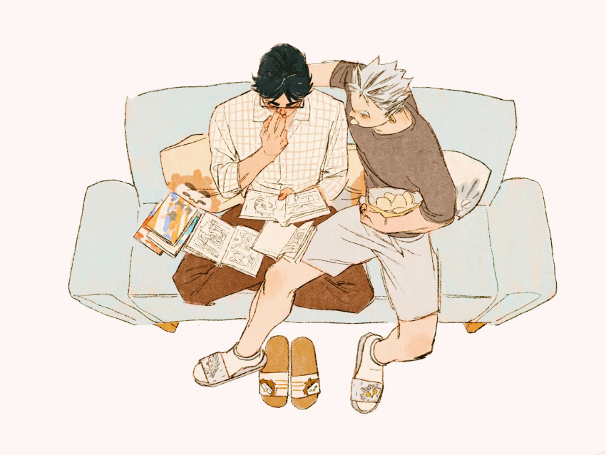 2boys adjusting_eyewear akaashi_keiji animal_print bag_of_chips bird_print black_hair bokuto_koutarou book brown_pants chengongzi123 chips_(food) closed_eyes collared_shirt commentary couch food food_in_mouth full_body glasses grey_hair grey_shirt grey_shorts haikyuu!! hand_up highres holding holding_book holding_food indian_style male_focus manga_(object) meta mouth_hold multicolored_hair multiple_boys on_couch owl_print pants pillow pink_background plaid plaid_shirt potato_chips reading shirt short_hair shorts simple_background sitting slippers streaked_hair symbol-only_commentary unworn_footwear very_short_hair