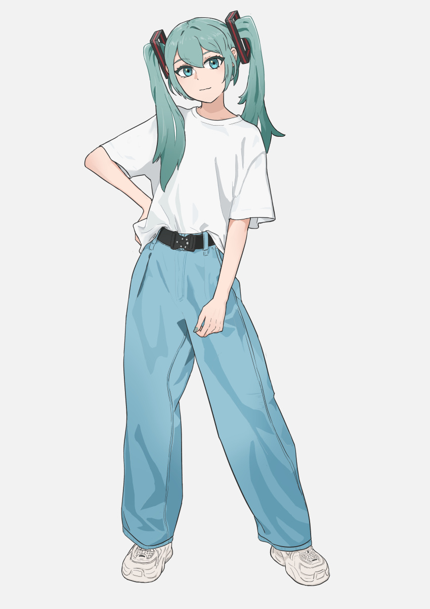 1girl absurdres baggy_pants belt blue_eyes blue_hair denim full_body hair_ornament hand_on_own_hip hatsune_miku highres iiasun jeans long_hair looking_at_viewer nail_polish pants shirt shirt_partially_tucked_in shoes short_sleeves smile sneakers solo t-shirt twintails vocaloid