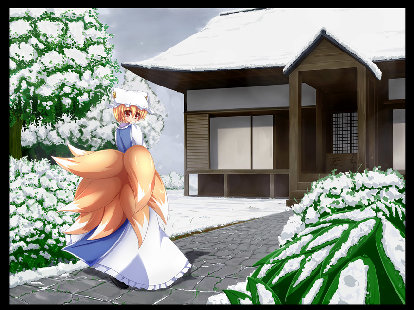 architecture blonde_hair border box cloud cloudy_sky donation_box dress east_asian_architecture fox_tail from_behind grass hat highres leaf liya long_sleeves looking_at_viewer looking_back multiple_tails path road short_hair sky snow solo tabard tail touhou tree white_dress winter yakumo_ran yellow_eyes