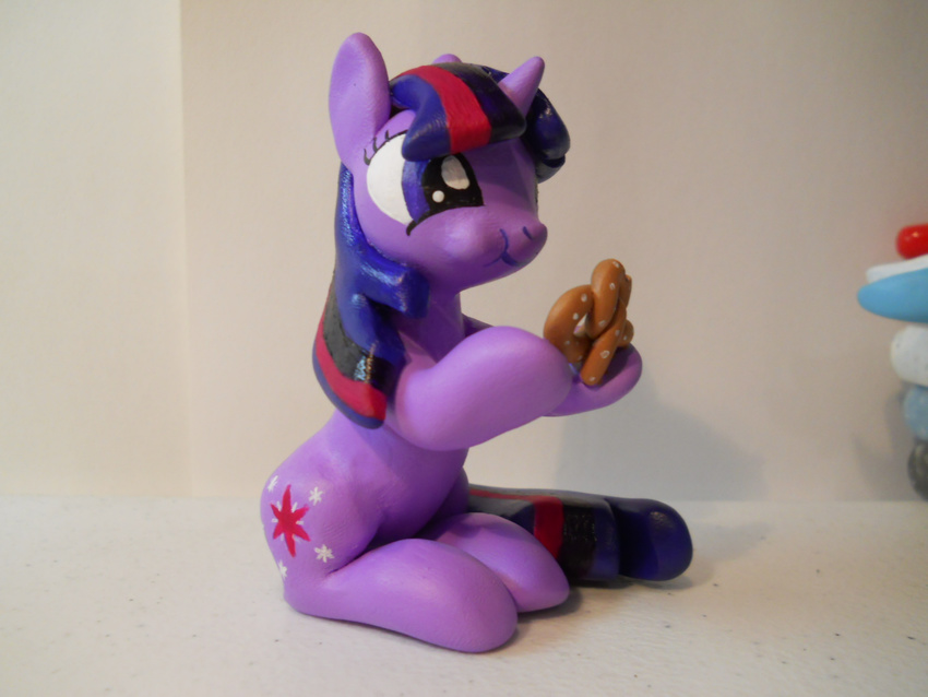 cutie_mark eating equine female feral friendship_is_magic hair hoikarnage horn horse mammal model multi-colored_hair my_little_pony nom pony pretzel pretzel_(food) pretzile purple_eyes real sitting solo twilight_sparkle_(mlp) unicorn