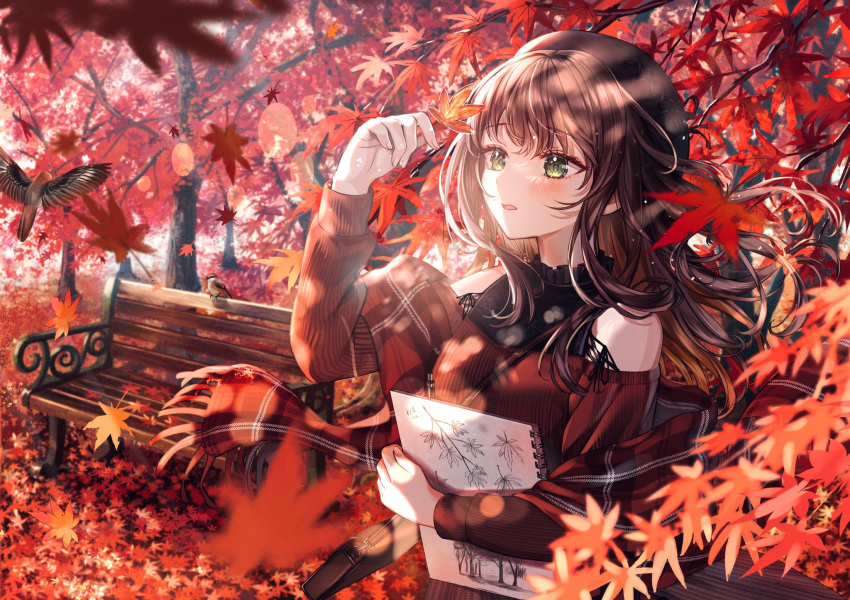 1girl autumn_leaves bare_shoulders bench beret bird black_headwear blurry blush book brown_hair clothing_cutout commentary_request depth_of_field falling_leaves floating_hair green_eyes halterneck hand_up hat highres holding holding_book holding_leaf leaf long_hair looking_at_object original outdoors parted_lips plaid_shawl red_shawl red_sweater sakura_(39ra) shawl shoulder_cutout solo sweater vertical-striped_sweater