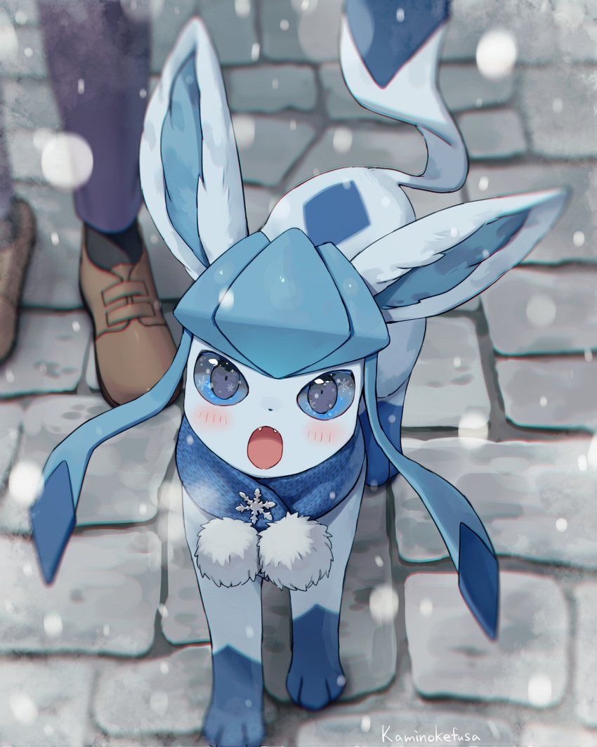 animal_ears artist_name blue_eyes blue_fur blush brown_footwear cobblestone eye_reflection fangs glaceon head_out_of_frame highres kaminokefusa open_mouth outdoors pants pokemon pokemon_(creature) pom_pom_(clothes) reflection scarf snow snowflake_ornament snowflakes snowing tail