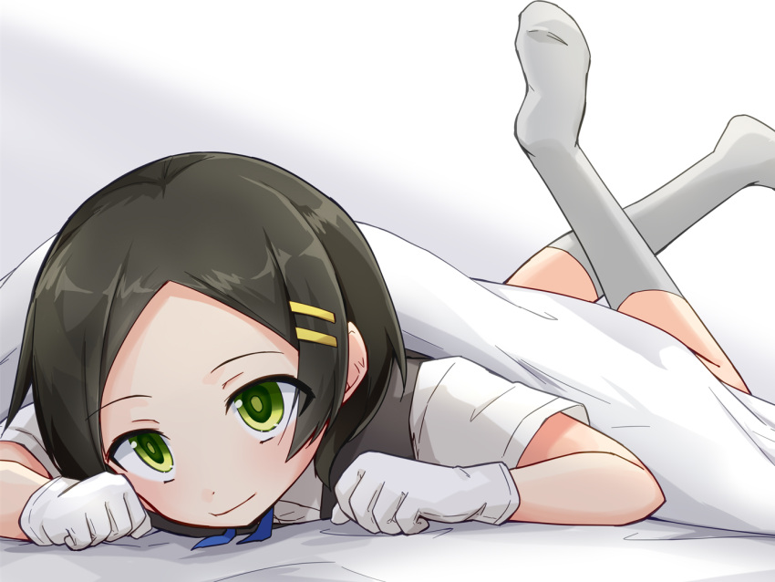 1girl black_hair blanket collared_shirt crossed_legs dress_shirt feet_up foot_out_of_frame gloves green_eyes grey_socks grey_vest hair_ornament hairclip kakizaki_(chou_neji) kantai_collection kuroshio_(kancolle) lying no_shoes on_stomach parted_bangs school_uniform shirt socks solo vest white_gloves white_shirt