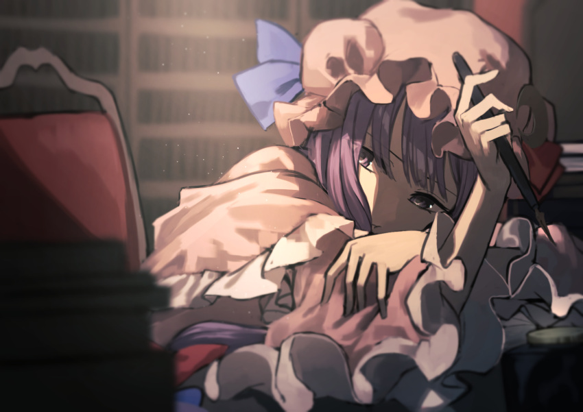 1girl blurry blurry_background book book_stack bookshelf closed_mouth depth_of_field frilled_sleeves frills hand_on_own_arm hat head_tilt highres indoors library mob_cap on_chair otoshiro_kosame patchouli_knowledge pink_hat purple_eyes purple_hair solo touhou wide_sleeves