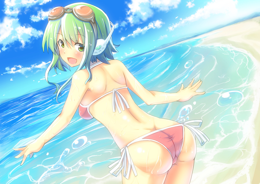 :d absurdres ass back bad_id bad_pixiv_id beach bikini blush butt_crack day dutch_angle from_behind goggles goggles_on_head green_eyes green_hair gumi headphones highres leaning_forward looking_back nahu ocean open_mouth outdoors short_hair side-tie_bikini smile solo swimsuit vocaloid water wet