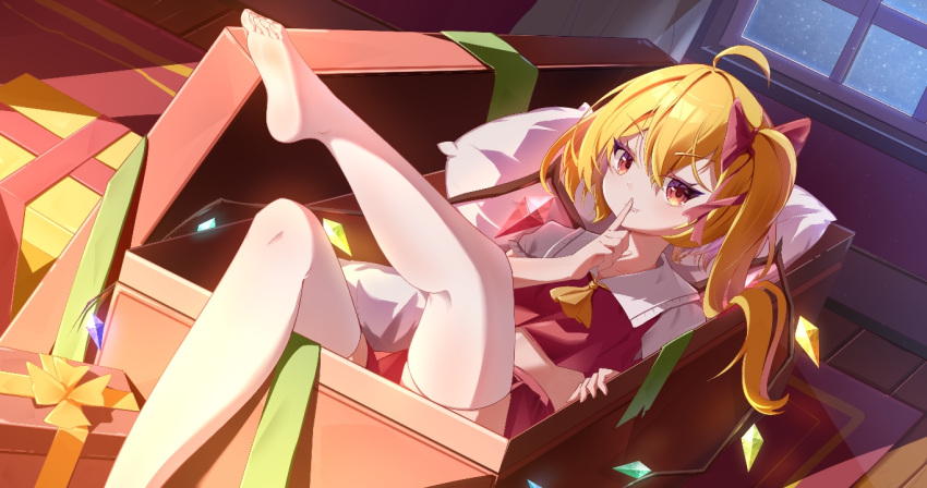 1girl ahoge ascot blonde_hair christmas dress feet finger_to_mouth flandre_scarlet full_body gift indoors kk_snake on_bed pillow red_dress red_eyes red_ribbon ribbon shushing side_ponytail solo thighhighs touhou yellow_ascot