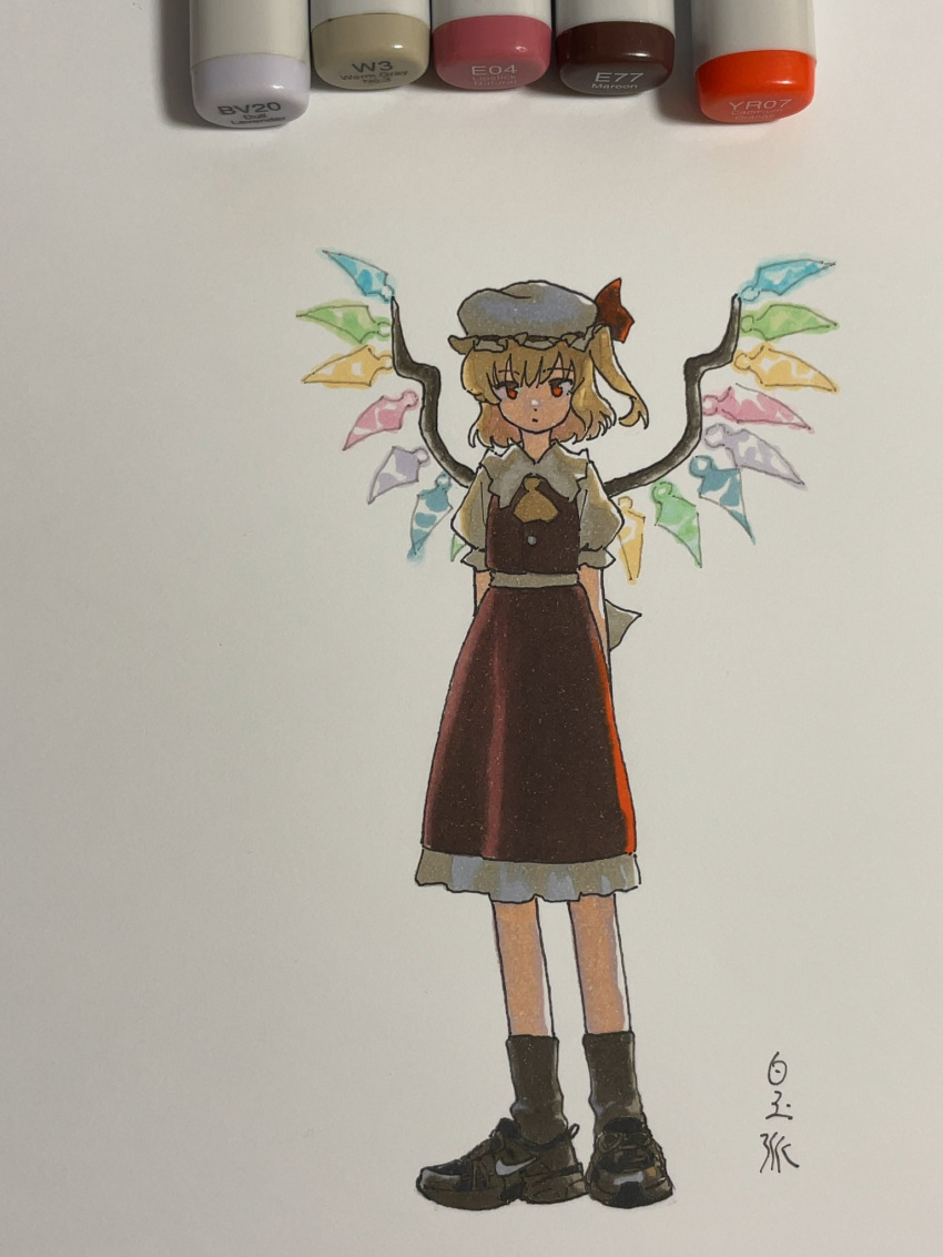 1girl arms_behind_back art_tools_in_frame ascot blonde_hair closed_mouth dress expressionless flandre_scarlet frilled_hat frills full_body hat highres looking_at_viewer marker_(medium) mob_cap multicolored_wings nike_(company) one_side_up photo_(medium) puffy_short_sleeves puffy_sleeves red_dress red_eyes shiratama_(hockey) shoes short_hair short_sleeves signature sneakers solo standing touhou traditional_media white_hat wings yellow_ascot