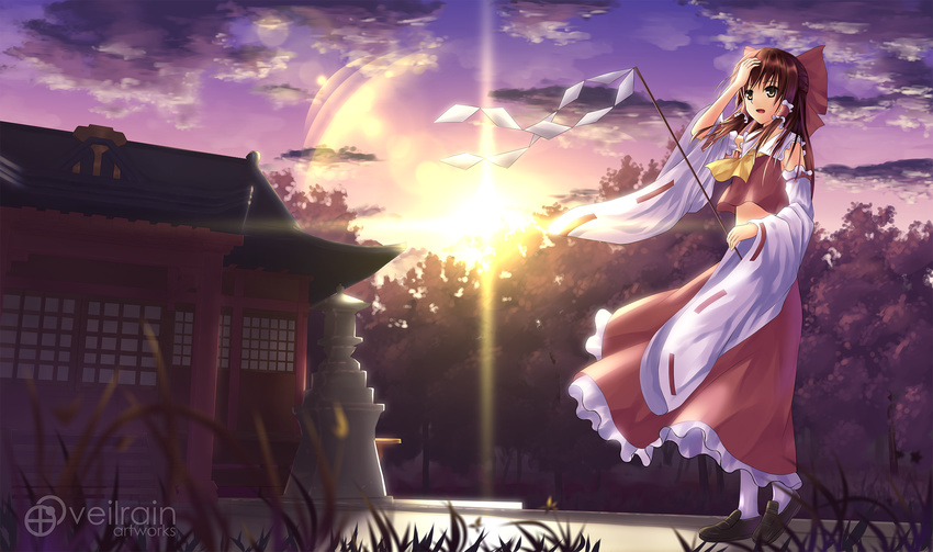 architecture bad_id bad_pixiv_id bare_shoulders bow brown_eyes brown_hair building cloud detached_sleeves full_body gohei hair_bow hair_tubes hakurei_reimu highres holding japanese_clothes lens_flare light_rays long_sleeves miko outdoors shrine solo standing sun sunlight touhou tree twilight veilrain vest watermark