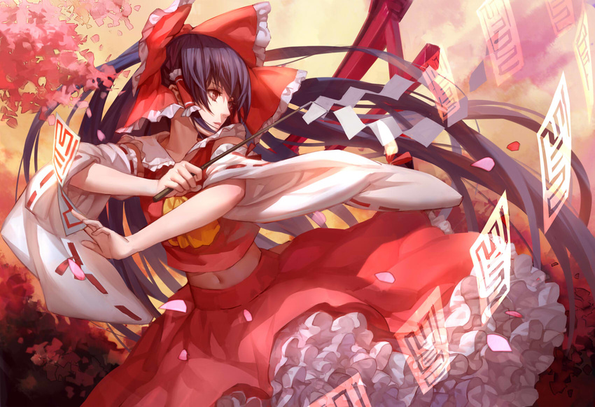 ascot ask_(askzy) black_hair bow brown_eyes danmaku detached_sleeves frilled_skirt frills gohei hair_bow hair_tubes hakurei_reimu highres lips long_hair midriff navel ofuda petals skirt sky solo too_many too_many_frills torii touhou wide_sleeves