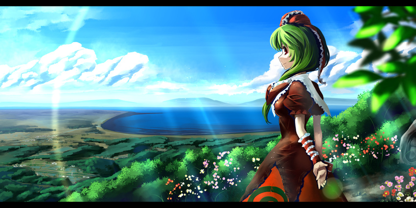 arm_ribbon arms_behind_back blue_sky bow capelet cloud commentary day flower forest front_ponytail green_hair hair_bow highres kagiyama_hina lake landscape letterboxed looking_at_viewer nature puffy_sleeves red_eyes ribbon shirt short_sleeves skirt sky smile solo sunlight touhou town tree umigarasu_(kitsune1963)