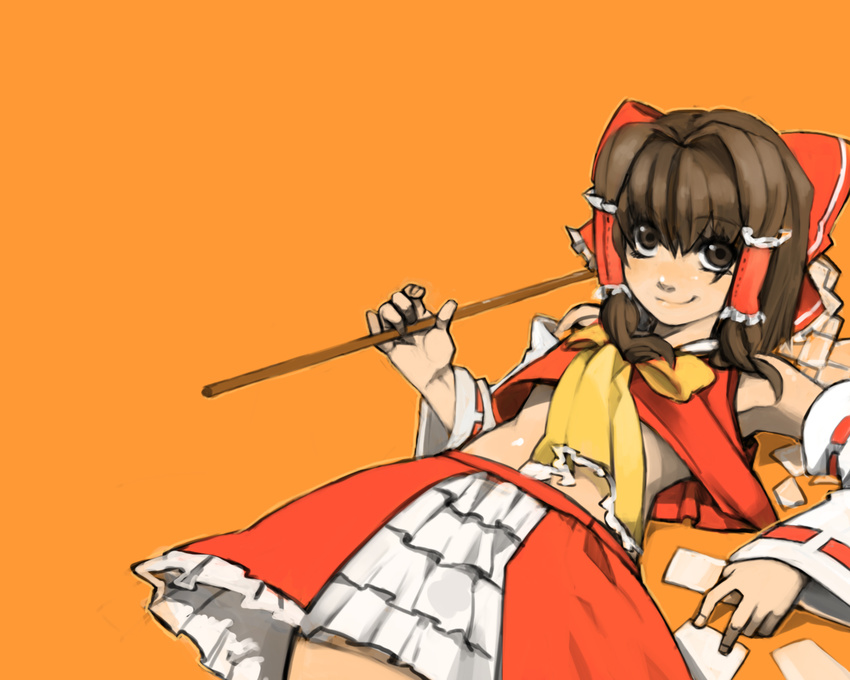 adapted_costume bad_id bad_pixiv_id brown_eyes brown_hair detached_sleeves frilled_skirt frills gohei hakurei_reimu looking_at_viewer midriff orange_background ribbon simple_background skirt solo touhou tsurusaki_yuu