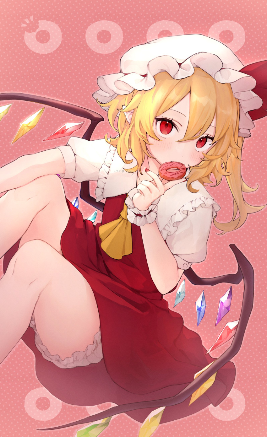 1girl absurdres ascot blonde_hair bloomers blush bow commentary crystal double-parted_bangs doughnut eating eyelashes feet_out_of_frame flandre_scarlet food frilled_shirt_collar frills hair_between_eyes hand_up hat hat_bow highres holding_doughnut honotai knees_up looking_at_viewer medium_hair mob_cap pink_background puffy_short_sleeves puffy_sleeves red_bow red_nails red_skirt red_vest shirt short_sleeves side_ponytail signature simple_background sitting skirt solo thighs touhou tsurime upturned_eyes vest white_bloomers white_headwear white_shirt wings yellow_ascot