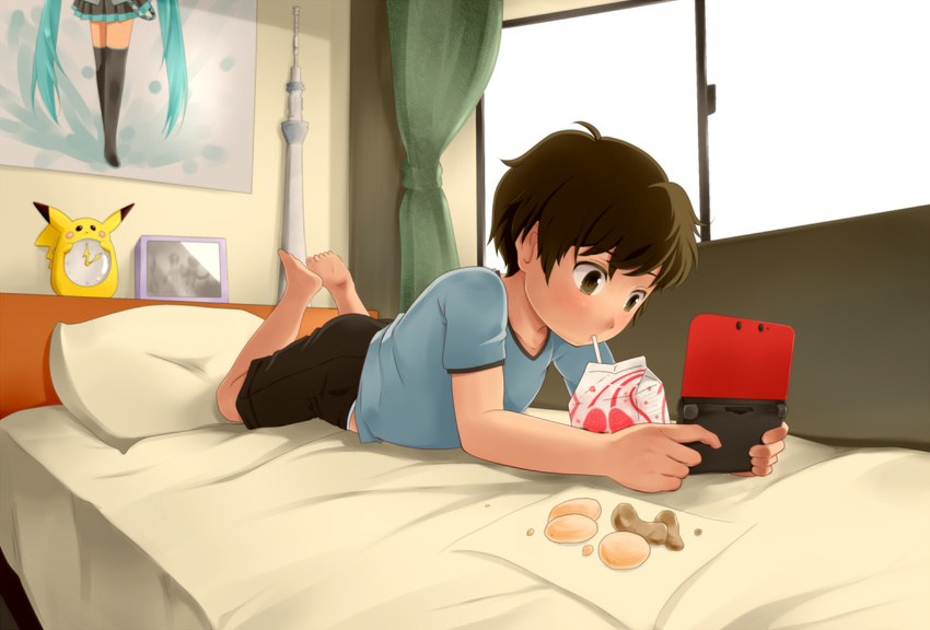 1boy barefoot bed blush brown_eyes brown_hair child clock cookie demando555 drinking food hatsune_miku indoors lying male male_focus nintendo_3ds nintendo_ds on_stomach photo_(object) picture pikachu pillow playing_games pokemon shirt short_hair shorts solo t-shirt toes vocaloid window