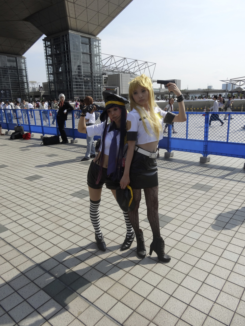 absurdres ankle_boots belt black_legwear boots comiket82 cosplay cross-laced_footwear gloves gun hat high_heel_boots high_heels highres legwear navel necktie panty_&amp;_stocking_with_garterbelt panty_(cosplay) patterned_legwear photo skirt socks stocking_(cosplay) thighs weapon white_belt
