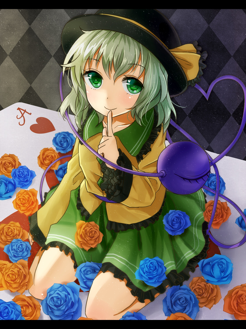 argyle argyle_background blue_flower blue_rose blush card_game eyeball finger_to_mouth flower green_eyes green_hair hat hat_ribbon heart heart_of_string highres komeiji_koishi long_sleeves orange_flower orange_rose ribbon rose shironeko_yuuki short_hair sitting skirt smile solo third_eye touhou wariza wide_sleeves