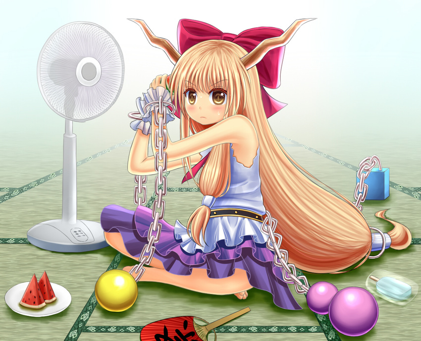 belt blonde_hair blue_background bow chain cube electric_fan fan food frown fruit gin_fuaru gourd gradient gradient_background hair_bow hand_behind_head horns ibuki_suika ice indian_style long_hair looking_at_viewer low-tied_long_hair paper_fan plate popsicle shirt sitting skirt sleeveless sleeveless_shirt slit_pupils solo sphere sweat tatami touhou uchiwa very_long_hair watermelon wrist_cuffs yellow_eyes