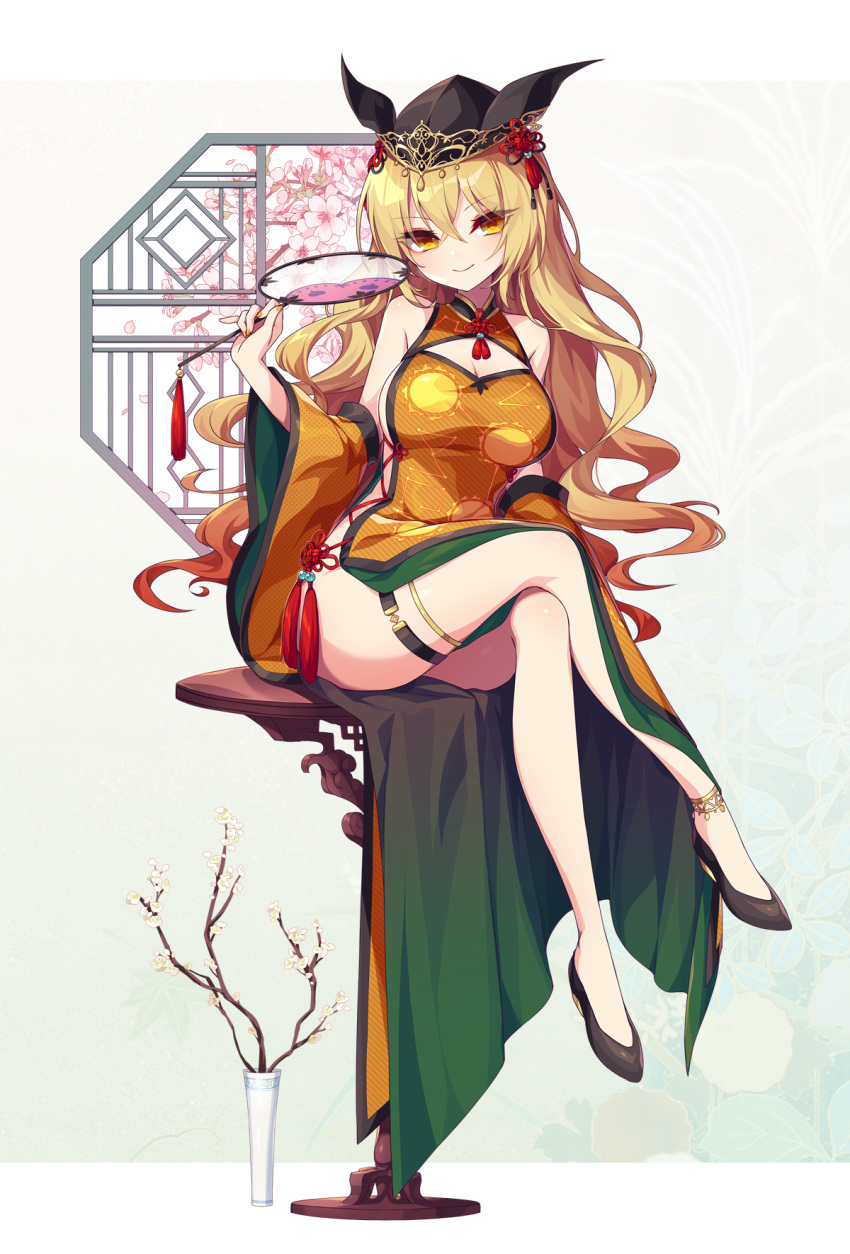 1girl adapted_costume ass black_footwear black_headwear blonde_hair breasts cherry_blossoms cleavage closed_mouth constellation_print crossed_legs full_body green_skirt hair_between_eyes hand_fan hat highres holding holding_fan kozakura_(dictionary) large_breasts long_hair matara_okina orange_sleeves shoes skirt smile solo tabard touhou wide_sleeves yellow_eyes