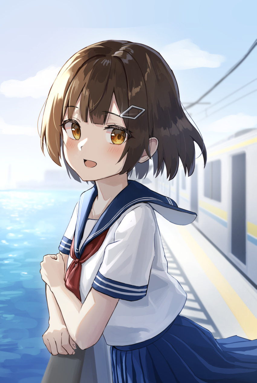 1girl blue_sailor_collar blue_skirt blue_sky blush breasts brown_hair hair_ornament highres keiyo_earth looking_at_viewer neckerchief ocean orange_eyes original outdoors overhead_line power_lines red_neckerchief sailor_collar school_uniform serafuku shirt short_hair skirt sky small_breasts solo sun_glare train train_station uniform white_shirt