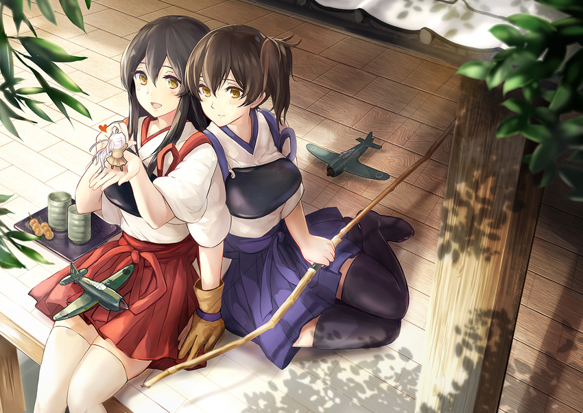 2girls akagi_(kancolle) brown_eyes brown_hair fairy_(kancolle) food japanese_clothes kaga_(kancolle) kantai_collection long_hair ponytail short_hair tagme_(artist) thighhighs