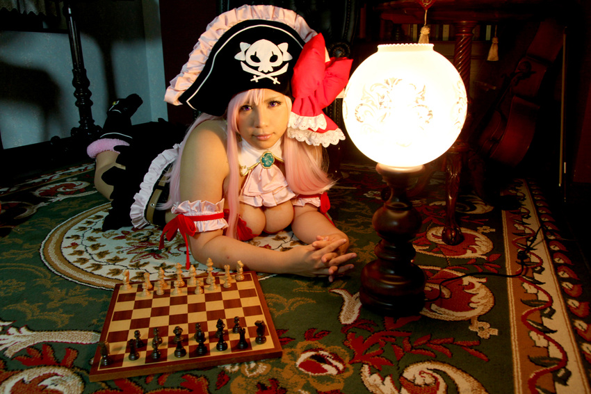 1girl board_game breasts captain_liliana captain_liliana_(cosplay) chess chouzuki_maryou cosplay hat large_breasts photo pink_hair pirate pirate_hat plump purple_eyes queen's_blade queen's_blade queen's_blade_rebellion