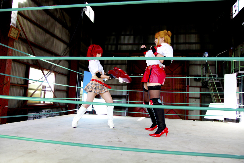 arena blonde_hair boxing_ring breasts candy_cane_(rumble_roses) candy_cane_(rumble_roses)_(cosplay) chouzuki_maryou cleavage cosplay fingerless_gloves gloves guitar instrument large_breasts miss_spencer miss_spencer_(cosplay) multiple_girls photo red_hair rumble_roses rumble_roses_xx suzuka_itsuki