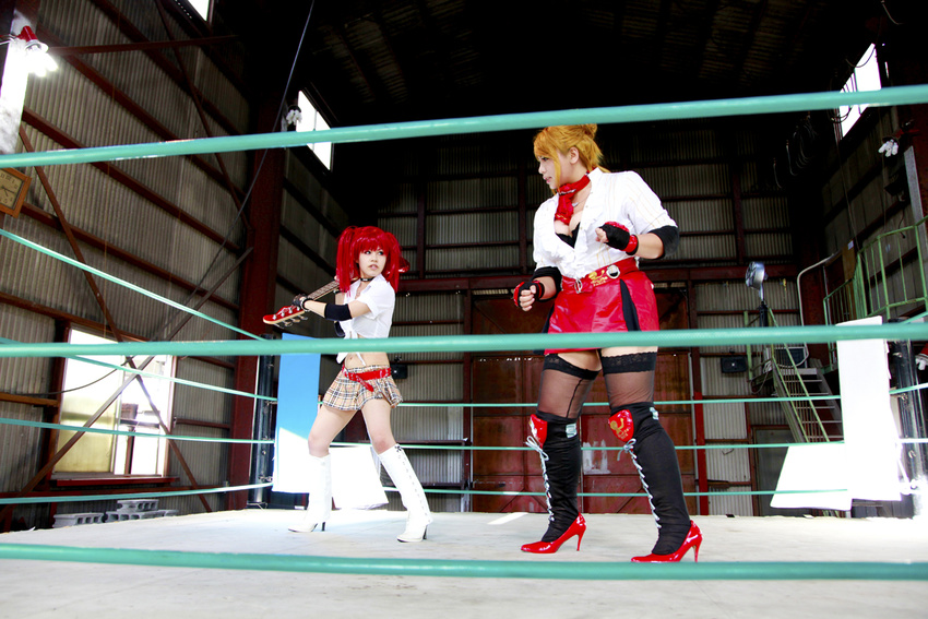 arena blonde_hair boxing_ring breasts candy_cane_(rumble_roses) candy_cane_(rumble_roses)_(cosplay) chouzuki_maryou cleavage cosplay fingerless_gloves gloves guitar instrument large_breasts miss_spencer miss_spencer_(cosplay) multiple_girls photo red_hair rumble_roses rumble_roses_xx suzuka_itsuki