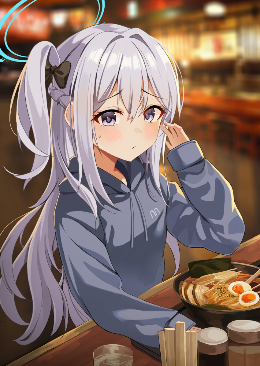 1girl absurdres alternate_costume blue_archive blurry bow bowl braid casual chopsticks commentary_request cup depth_of_field drinking_glass food french_braid grey_hair grey_sweater hair_between_eyes hair_bow hair_ribbon halo highres hood hooded_sweater leepy long_hair long_sleeves looking_at_viewer miyako_(blue_archive) noodles one_side_up outdoors photo_background purple_eyes ramen ribbon sidelocks single_braid solo sweatdrop sweater table water