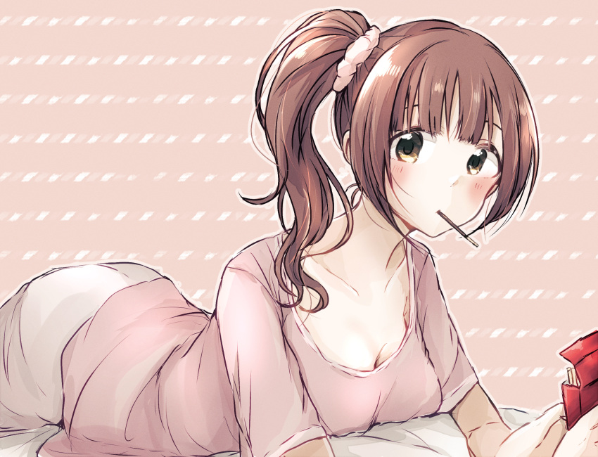 1girl baran._(ba_ra_ran) blush box breasts brown_background brown_hair cleavage collarbone downblouse food hair_ornament hair_scrunchie highres holding holding_box idolmaster idolmaster_cinderella_girls igarashi_kyoko looking_at_viewer lying medium_breasts mouth_hold no_bra on_stomach pink_scrunchie pink_shirt pocky scrunchie shirt side_ponytail solo white_shirt yellow_eyes